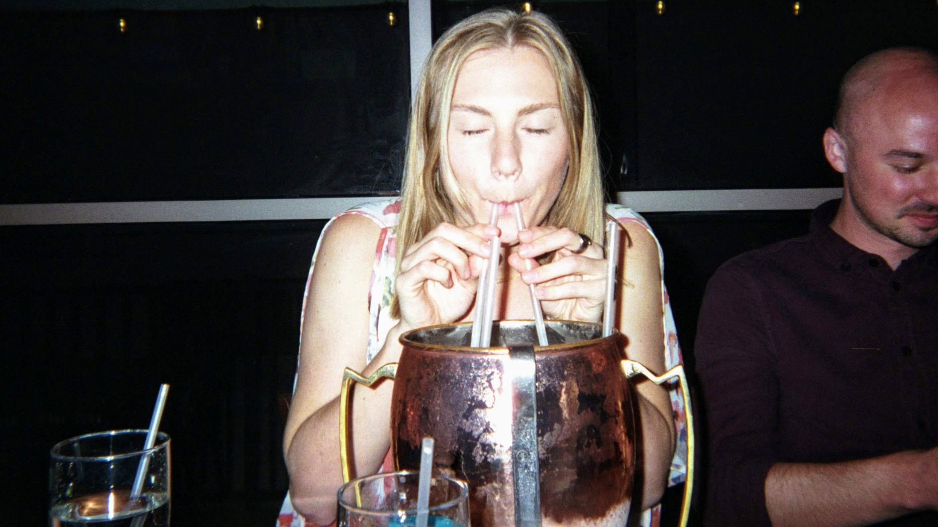 allyson drinking a moscow mule taken with a disposable camera
