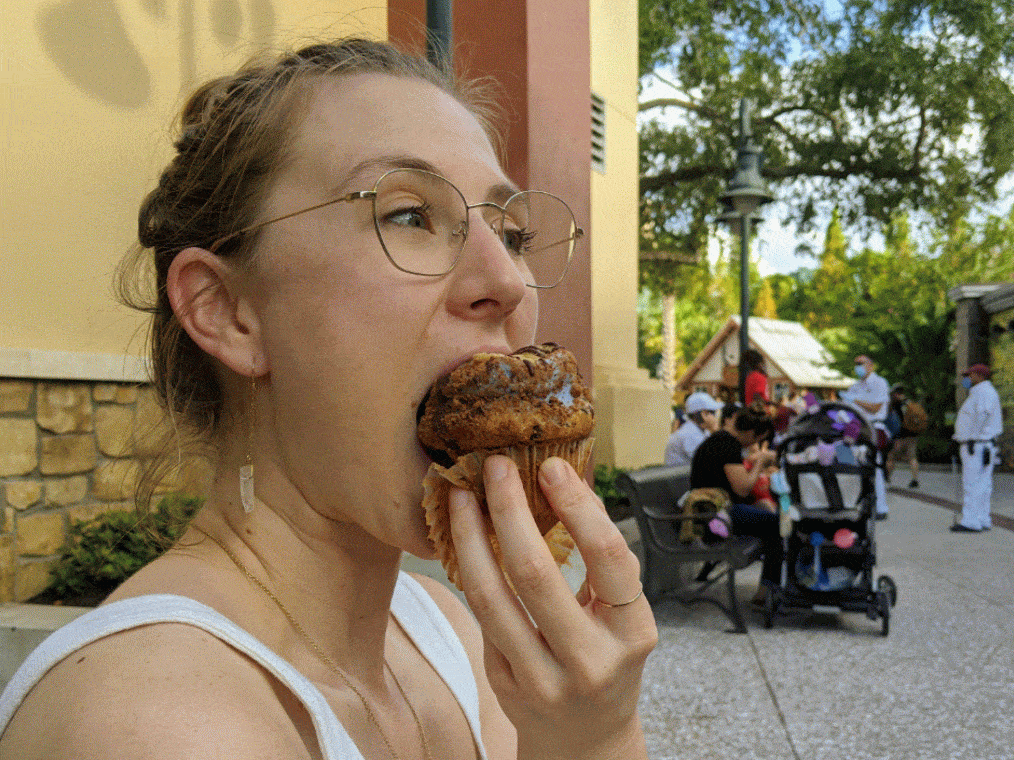 allyson eating a cupcake at Erin McKenna's Bakery at disney springs