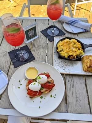 canvas lake nona eggs Benedict and cocktails, plus an egg skillet and biscuit 